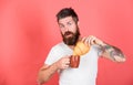 Aroma of fresh baked croissant. But first coffee. Bearded hipster enjoy breakfast drink coffee. Man start morning with Royalty Free Stock Photo