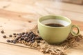 Aroma hot black coffee or Americano and Arabica coffee bean Royalty Free Stock Photo