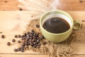 aroma hot black coffee or Americano and Arabica coffee bean Royalty Free Stock Photo