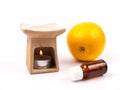 Aroma lamp with citrus oil and citrus Royalty Free Stock Photo