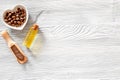 Aroma spa set. Coffee grains, coffee spa salt, oil on wooden table background top view copyspace Royalty Free Stock Photo