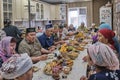 Residents of a Siberian village celebrate the Muslim holiday Kurban Bayram at their home table. Eid al-Adha, the