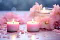 Aromatherapy concept, candles with flowers. Soy candles with flowers scent. Spa candles with a pleasant aroma