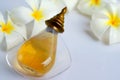 Aromatherapy concept with fresh frangipani flower Royalty Free Stock Photo