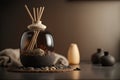 Aromatherapy diffuser with wooden sticks and stones on table
