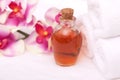 Aromatherapy oils, orchid and towels