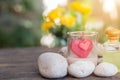 Aromatherapy product spa of therapy massage with plumeria or frangipani flowers, stones, aroma candle and oil on the desk,Spa Royalty Free Stock Photo