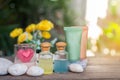 Aromatherapy product spa of therapy massage with plumeria or frangipani flowers, stones, aroma candle and oil on the desk,Spa Royalty Free Stock Photo