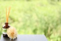 Aromatherapy set on table on garden background