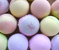 Aromatherapy spa bombs on desk. Many colored bath balls for beauty, skincare or relax Royalty Free Stock Photo