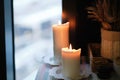 Aromatherapy votive candles burning with a soft glowing flame for a relaxation and pampering wellness treatment session