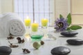 Aromatherapy votive candles burning with a soft glowing flame for wellness treatment in spa
