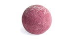 Aromatic bomb for the bathroom on a white background. aromatic bath ball of red color. Royalty Free Stock Photo