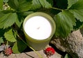 Aromatic candle in a candlestick