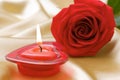 Aromatic candle and red rose Royalty Free Stock Photo