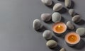 Aromatic candles and stones on a gray background. Spa composition. Relaxation and zen like concept. Flat lay. Copy space