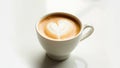 Aromatic cappuccino with a heart in a white mug on a light table. Morning coffee Royalty Free Stock Photo