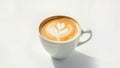 Aromatic cappuccino with a heart in a white mug on a light table. Royalty Free Stock Photo