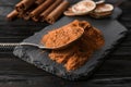 Aromatic cinnamon powder and sticks Royalty Free Stock Photo