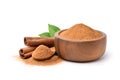 Aromatic cinnamon powder in wooden bowl