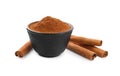 Aromatic cinnamon sticks and bowl with powder on white background Royalty Free Stock Photo