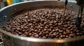 Aromatic coffee beans roasting on a modern machine, creating rich flavors and enticing aromas Royalty Free Stock Photo