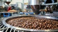 Aromatic coffee beans roasting on modern machine for rich, freshly brewed coffee