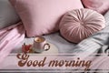 Aromatic coffee and beautiful flowers on bed with fresh linens. Good morning Royalty Free Stock Photo