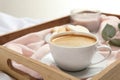 Aromatic coffee on tray. Tasty breakfast
