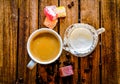 Aromatic coffee in a white cup with a glass milk jug next to it, Royalty Free Stock Photo