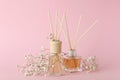 Aromatic concept with diffusers on pink