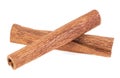 Aromatic dry cinnamon sticks isolated on white background. Two cinnamon sticks, front view Royalty Free Stock Photo