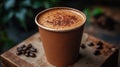 Aromatic, frothy coffee in a disposable cup Royalty Free Stock Photo