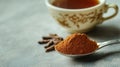 Aromatic ground cinnamon with cloves and tea in vintage cup Royalty Free Stock Photo