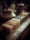 Aromatic Handmade Soap Bars on Rustic Wooden Surface A close up image showcasing a collection of natural soaps Royalty Free Stock Photo