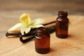 Aromatic homemade vanilla extract on table, closeup Royalty Free Stock Photo