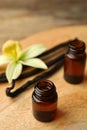 Aromatic homemade vanilla extract on table, closeup Royalty Free Stock Photo