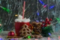 Aromatic hot winter cocoa drink with chewing marshmallows in a red cup with a straw, delicious gingerbread cookies, christmas Royalty Free Stock Photo