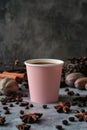 Aromatic Morning Brew: Paper Cup of Coffee With Beans and Spices