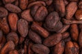 Aromatic raw cocoa beans background. Top view. Close up Royalty Free Stock Photo