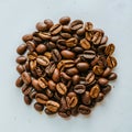 Aromatic roasted coffee beans scattered on a white background Royalty Free Stock Photo