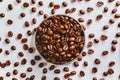 Aromatic roasted coffee beans scattered on a white background Royalty Free Stock Photo