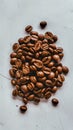 Aromatic roasted coffee beans scattered on a white background Royalty Free Stock Photo