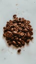 Aromatic roasted coffee beans scattered on a white background Royalty Free Stock Photo