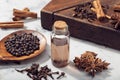 Aromatic seeds essential oil on glass bottle Royalty Free Stock Photo