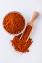 Aromatic spicy chili powder on a white background