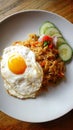 Aromatic Thai fried rice with egg, served on plate with space above for menu title Royalty Free Stock Photo
