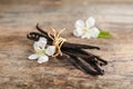 Aromatic vanilla sticks and flowers Royalty Free Stock Photo