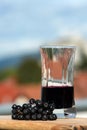 Aronia fruit and juice Royalty Free Stock Photo