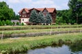 Arpasu de Sus, Sibiu, Romania, 16 July 2021: Landscape with Albota Trout Farm Pastravaria Albota in a sunny summer day